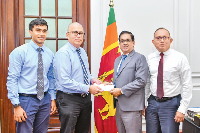 MAC Holdings contributes Rs. 5 million to ‘Rebuilding Sri Lanka’ Fund