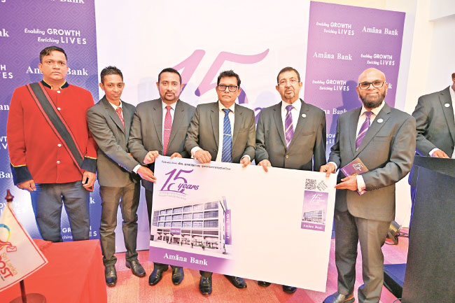Amãna Bank marks 15th Anniversary with Commemorative Cover and Stamp
